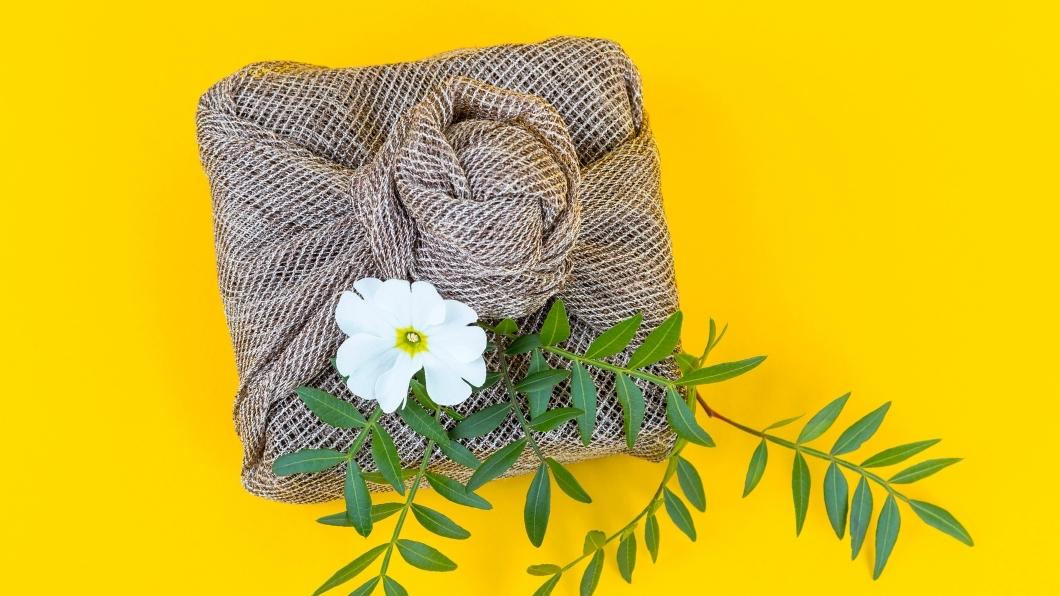 Jute Furoshiki gift wrap with flower and foliage decoration